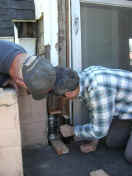 Dave and Duane jacking up the corner (588160 bytes)