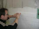 Arnie setting a tile with precision (287941 bytes)